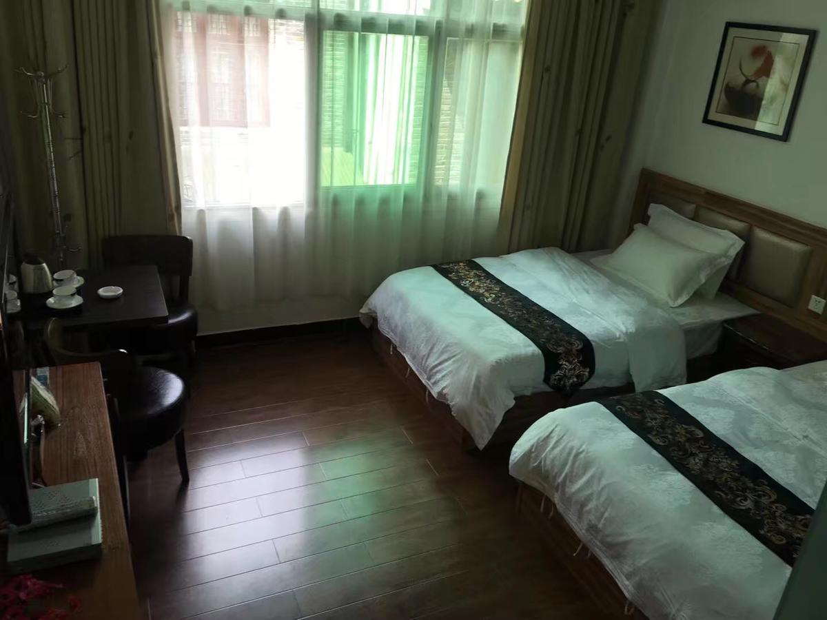 Fenghuang Little Bear Family Guest House Eksteriør bilde